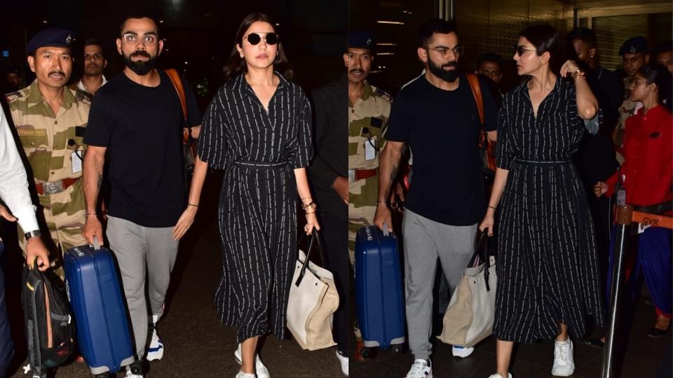 Virat Kohli has a protective arm around Anushka Sharma as they return ...