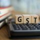 Experts on GST Council meet tomorrow: Expect revision of slabs, rate cut on auto, hotels, biscuits, cement, and steel – Moneycontrol.com