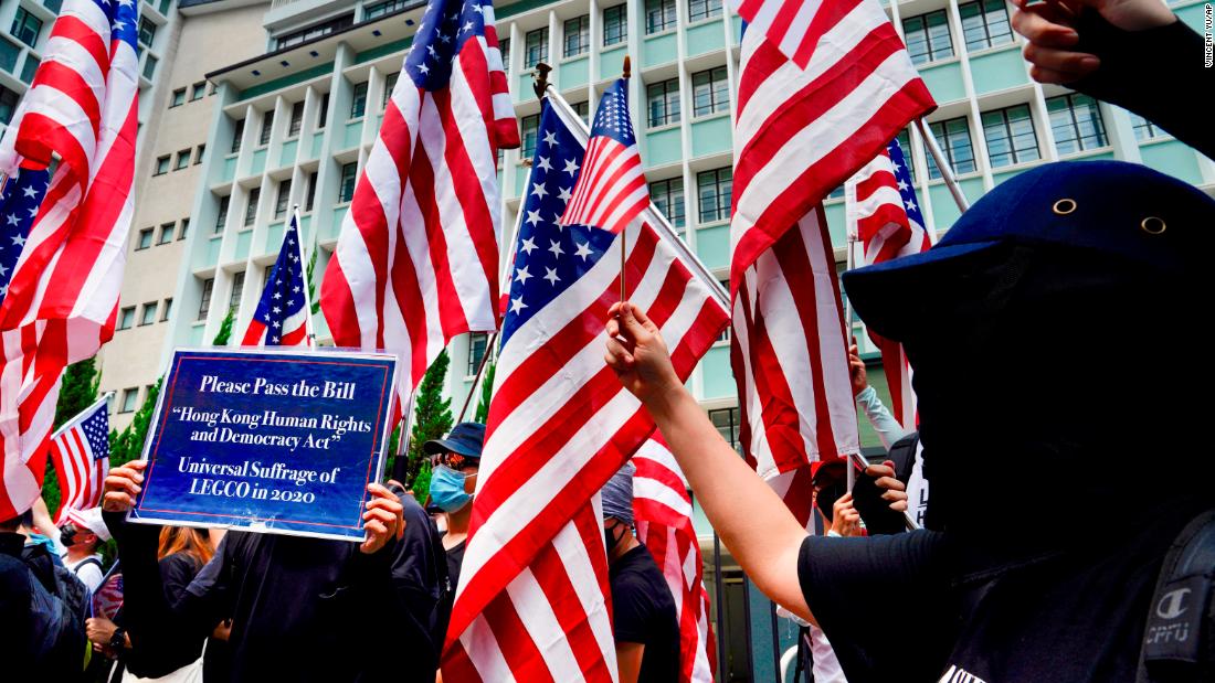Hong Kong protesters march to US Consulate to call for help from Trump